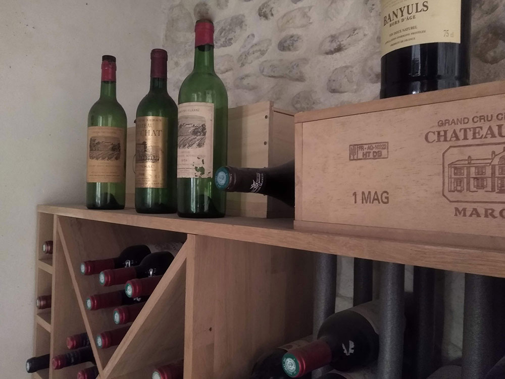 Cave à vin avant/après_réalisation casier bouteilles en chêne